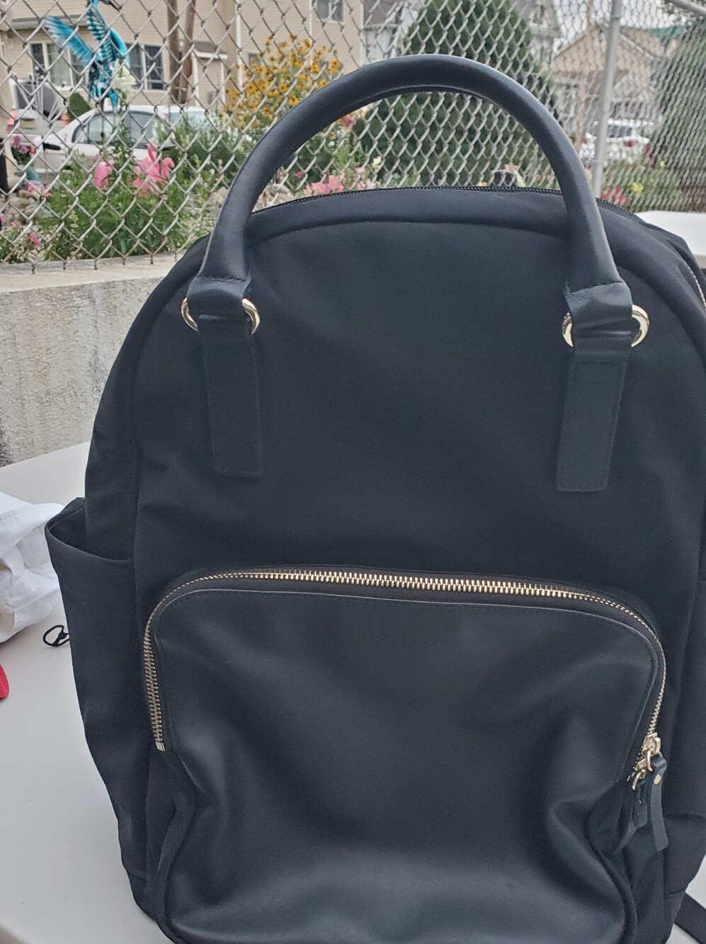 Lo & Sons Black Backpack with Gold Zipper Accents